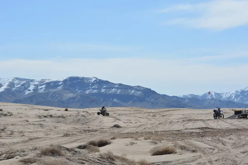 ATVs (quads) riding on the dunes at Little Sahara Recreation Area, Utah